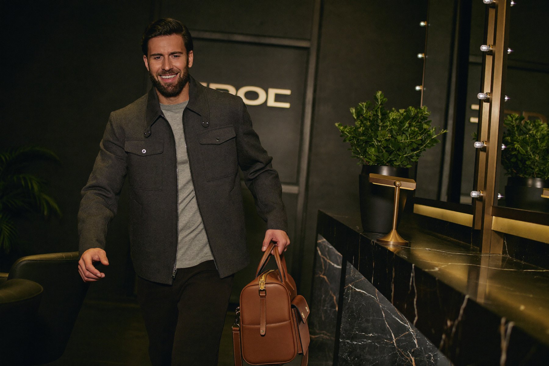 A confident Tuffs client walking through the clinic